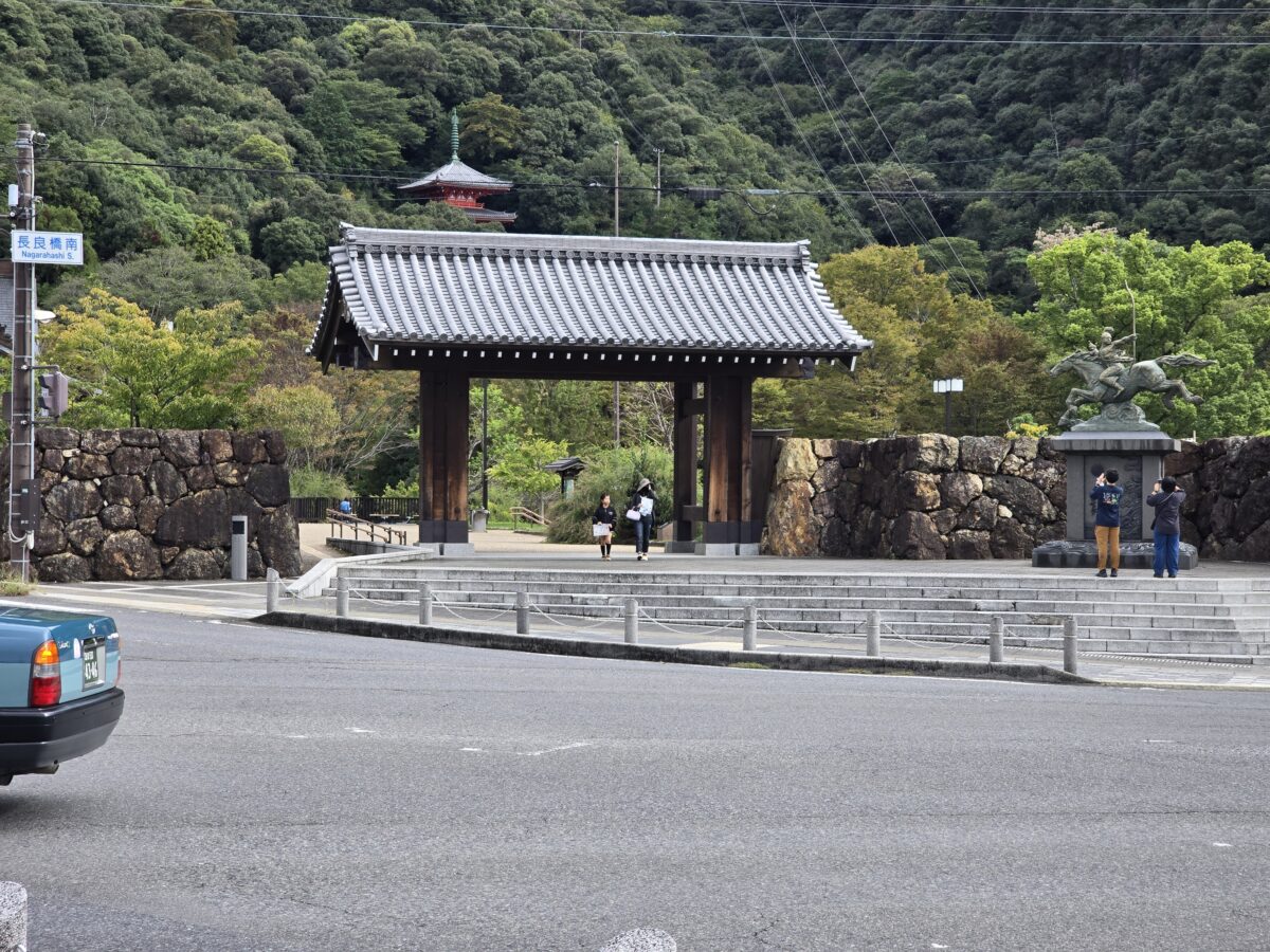image of Gifu entrance and behind it is the three storied pagoda